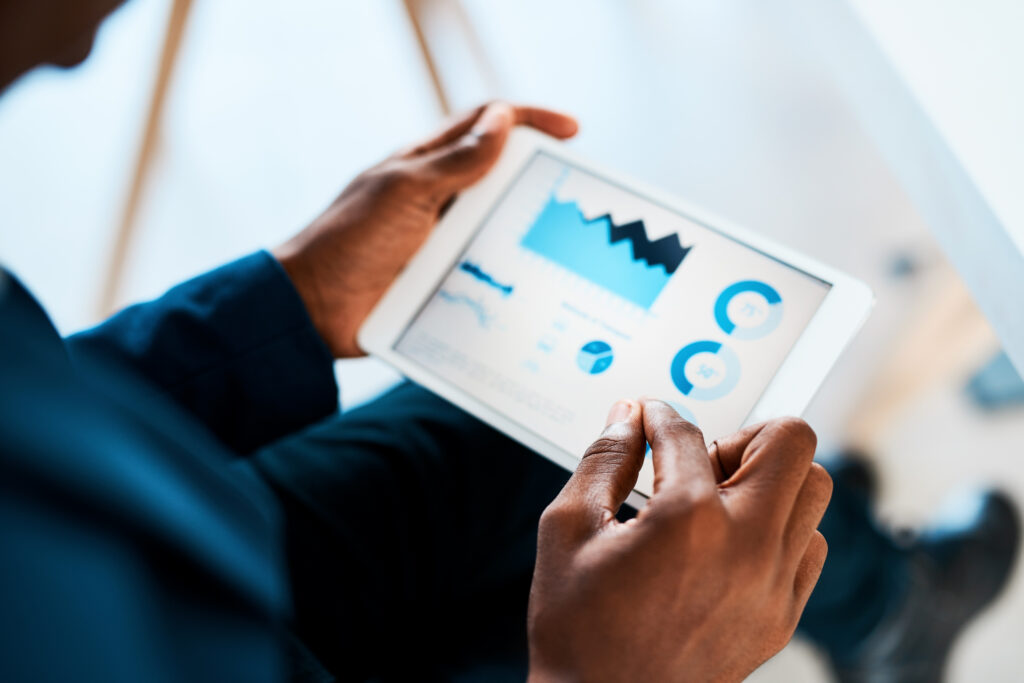 An school leader reviewing a dashboard of real-time enrollment insights